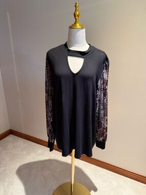 Maurices Black Keyhole Sweater with Printed Sheer Sleeves